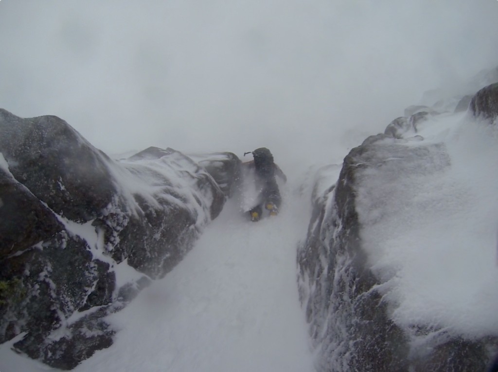 Ben dodging some spindrift  shooting down Red Gully.