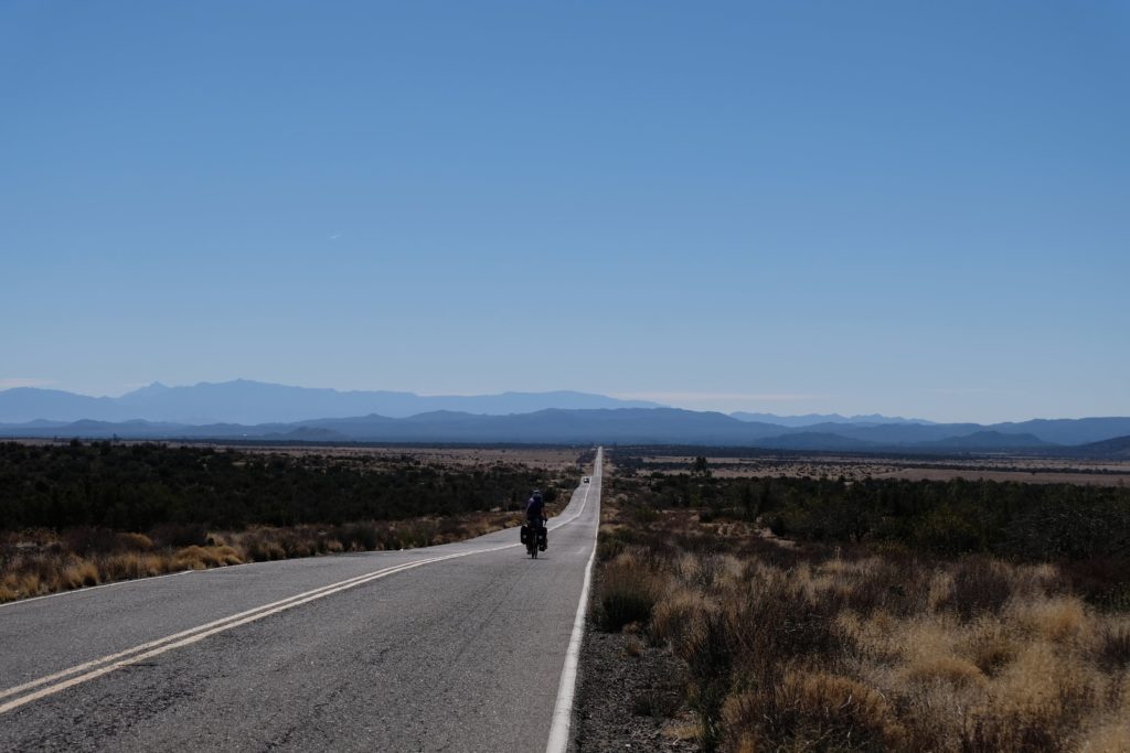 Cycling through the deserted roads of the desert